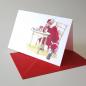 Preview: 100 Weihnachtskarten mit Kuverts: Weihnachtsmann am Tisch