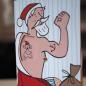 Preview: Recycling-Weihnachtskarte mit Drehscheibe: Weihnachtsmann mit Tattoos