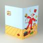 Preview: Recycling-Adventskarte mit Drehscheibe: Weihnachtsmann jongliert Geschenke