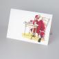 Preview: Weihnachtskarte: Pause - Weihnachtsmann sitzt am Tisch