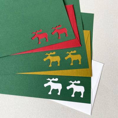 6 dunkelgrüne Weihnachtskarten mit farbigen Kuverts: gestanzte Elche