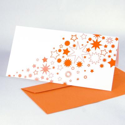 10 Weihnachtskarten mit orangen Umschlägen: Sterne