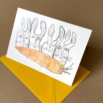 vier Hasen, eine Möhre - Grußkarte mit farbigem Umschlag