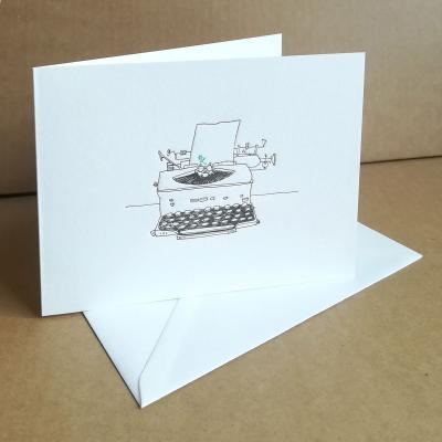 Grußkarte: Schreibmaschine mit grüner Blume