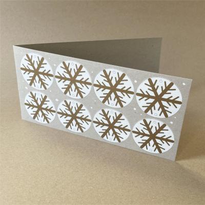 Recycling-Weihnachtskarte: Schneegestöber