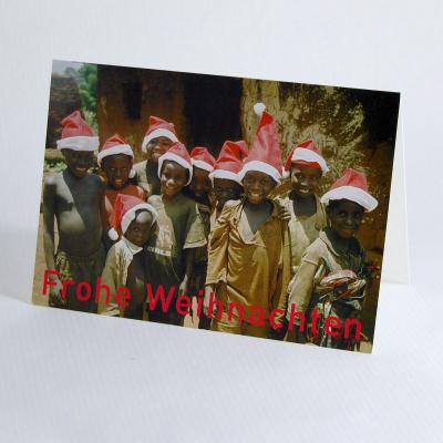 Weihnachtskarte mit Spende: Kinder mit Weihnachtsmannmützen
