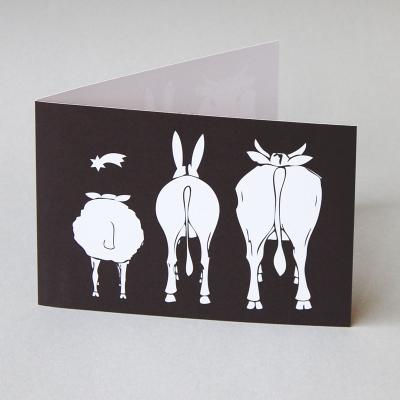 schwarz-weiße Weihnachtskarte: Ochs, Esel und Schaf