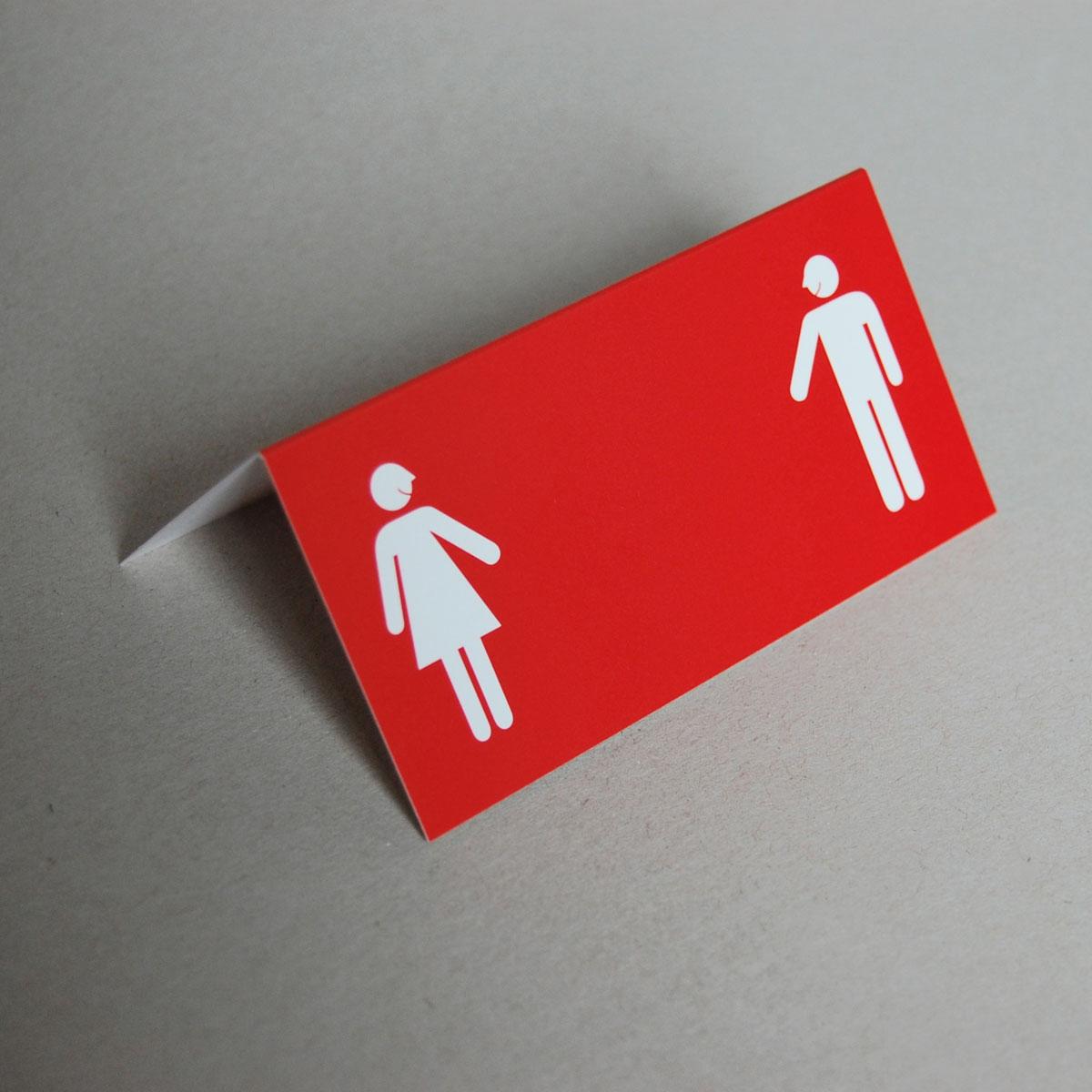 rote Tischkarte: Mann und Frau