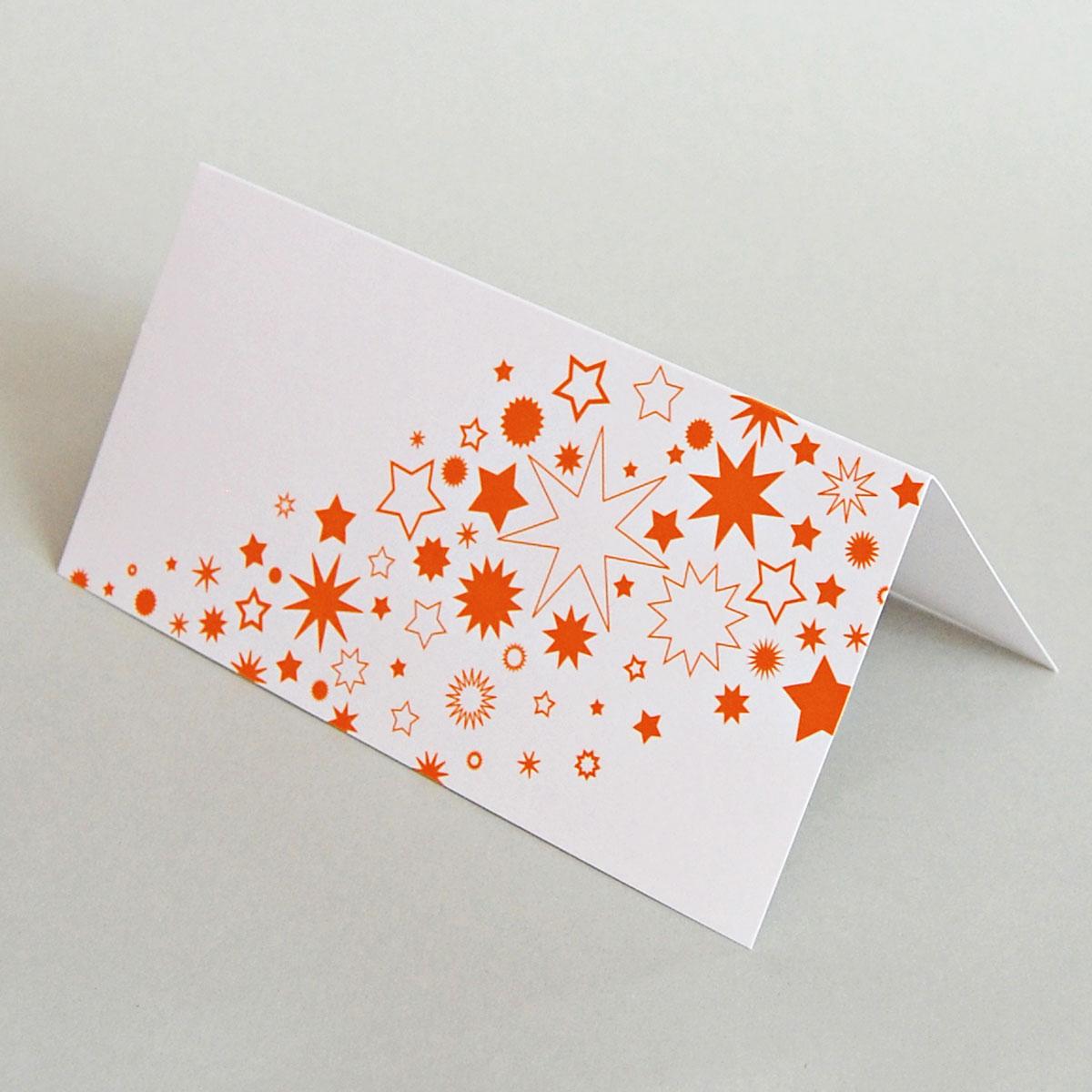 Weihnachtskarte: orange Sterne