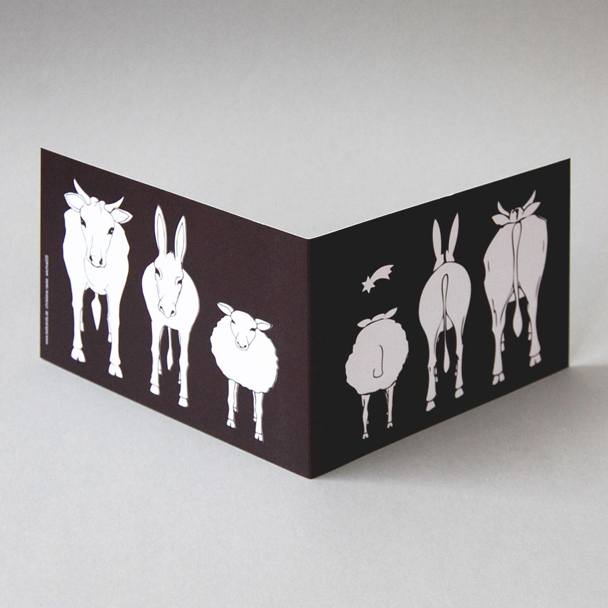 schwarz-weiße Weihnachtskarte: Ochs, Esel und Schaf